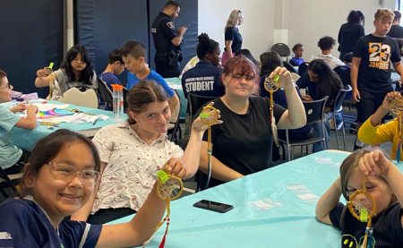 Kids making dream catchers 